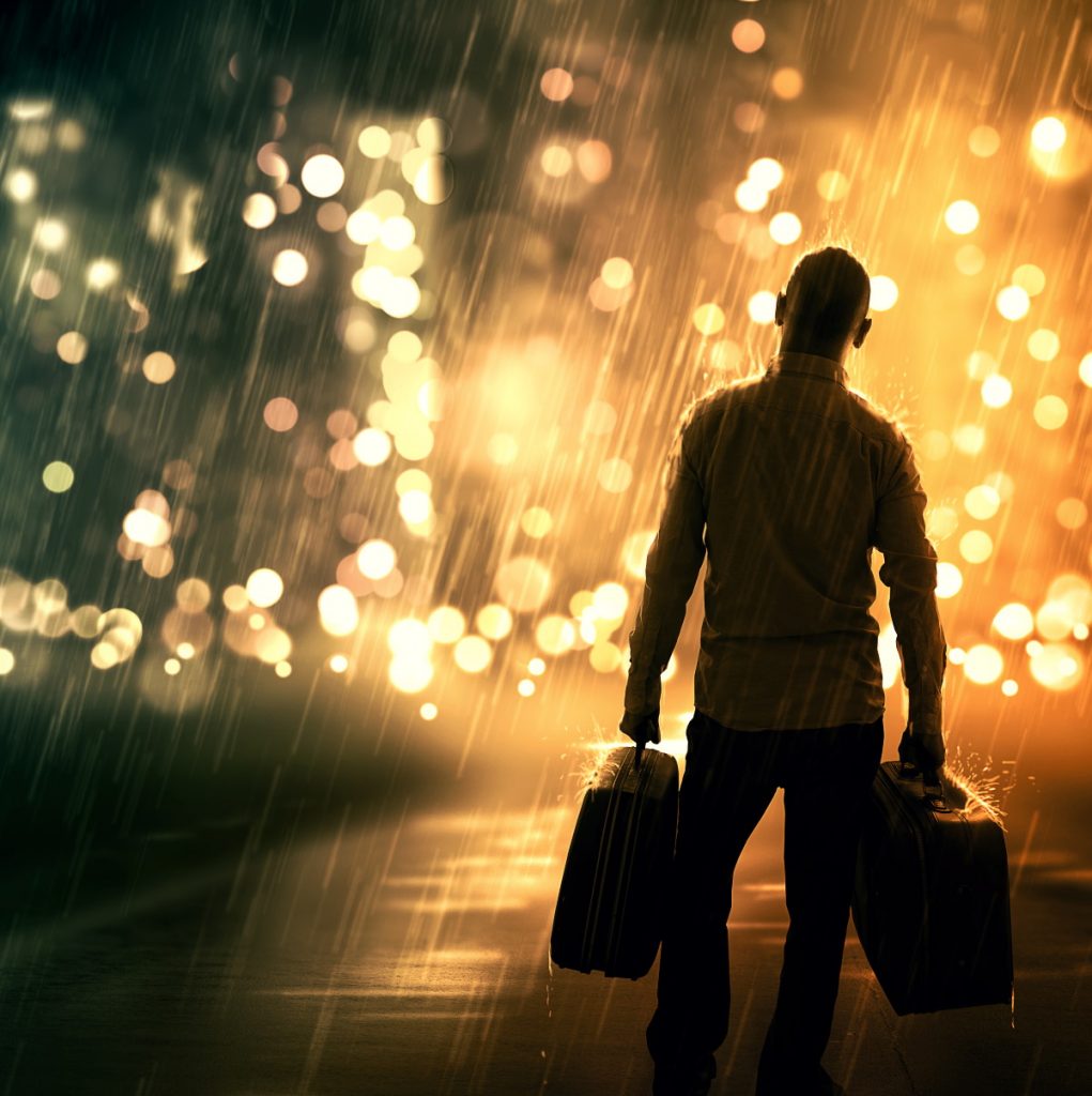 Man walks in the rain