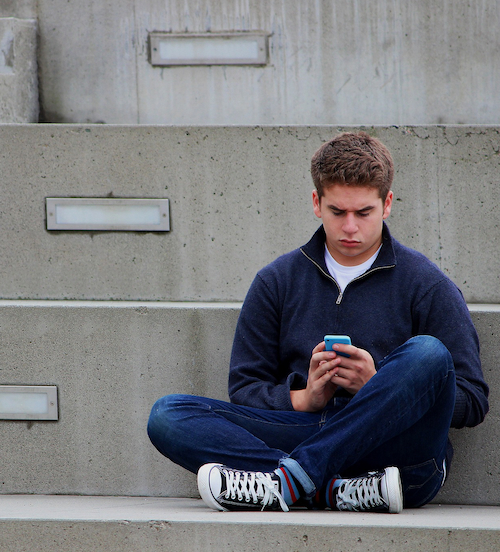 Young man texting